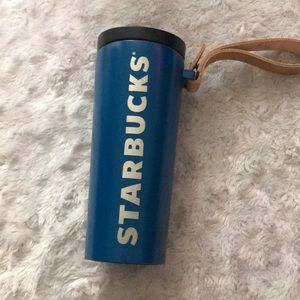 Starbucks cup with leather handle